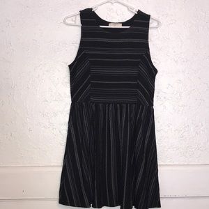 Elodie sleeveless black mini fit and flare dress